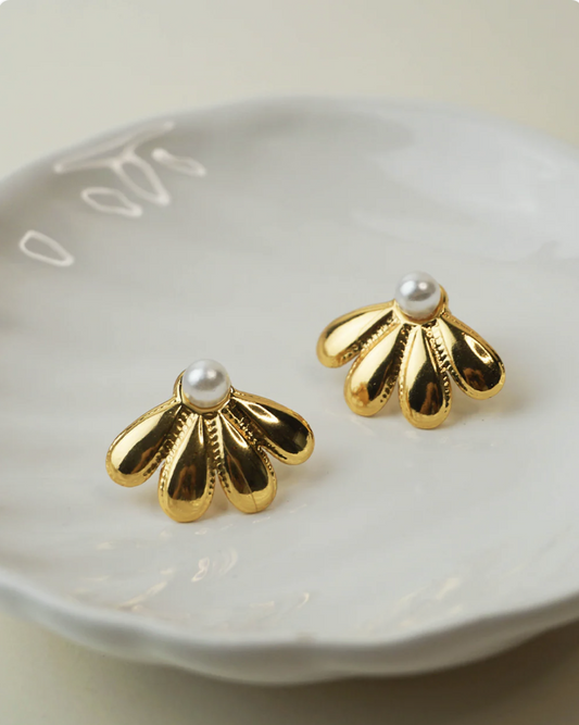 Aretes media flor